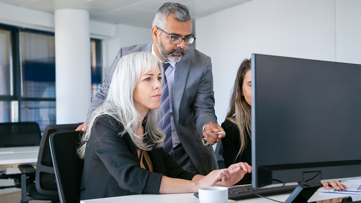Image shows a diverse background work culture.