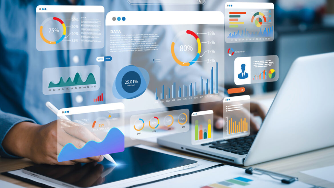 a person using a tablet and a laptop